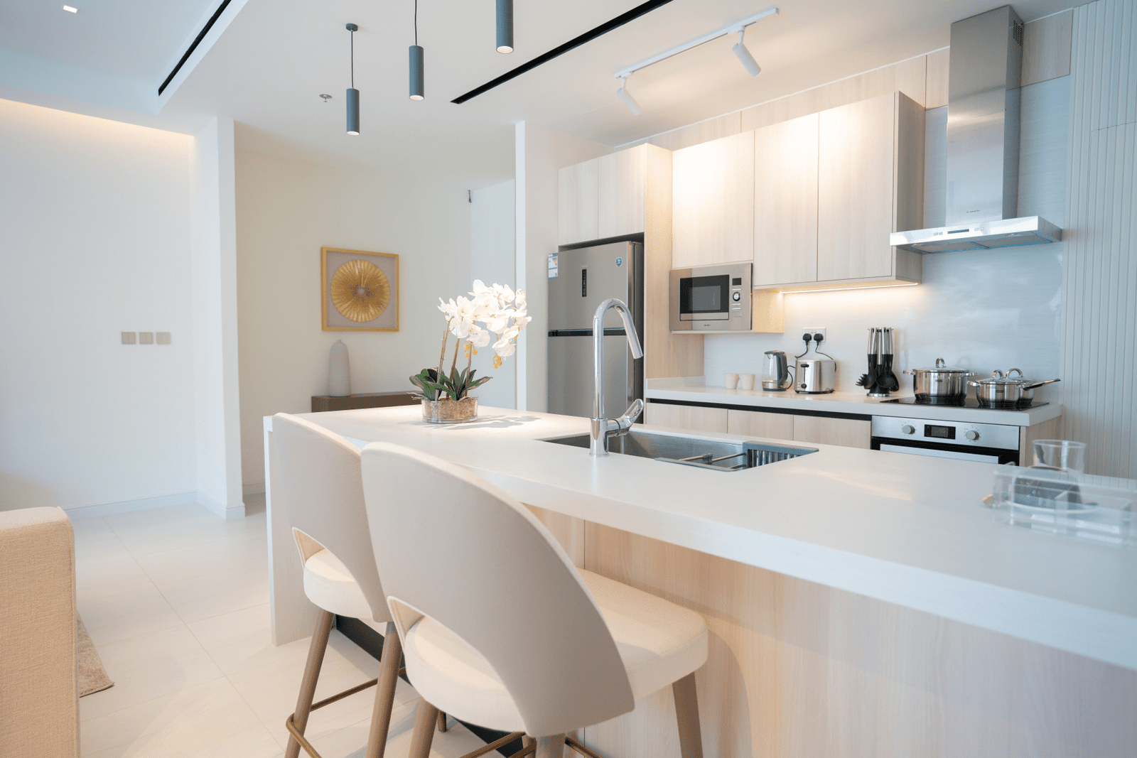 Close-up of the kitchen counter with high-end appliances and a stylish design.